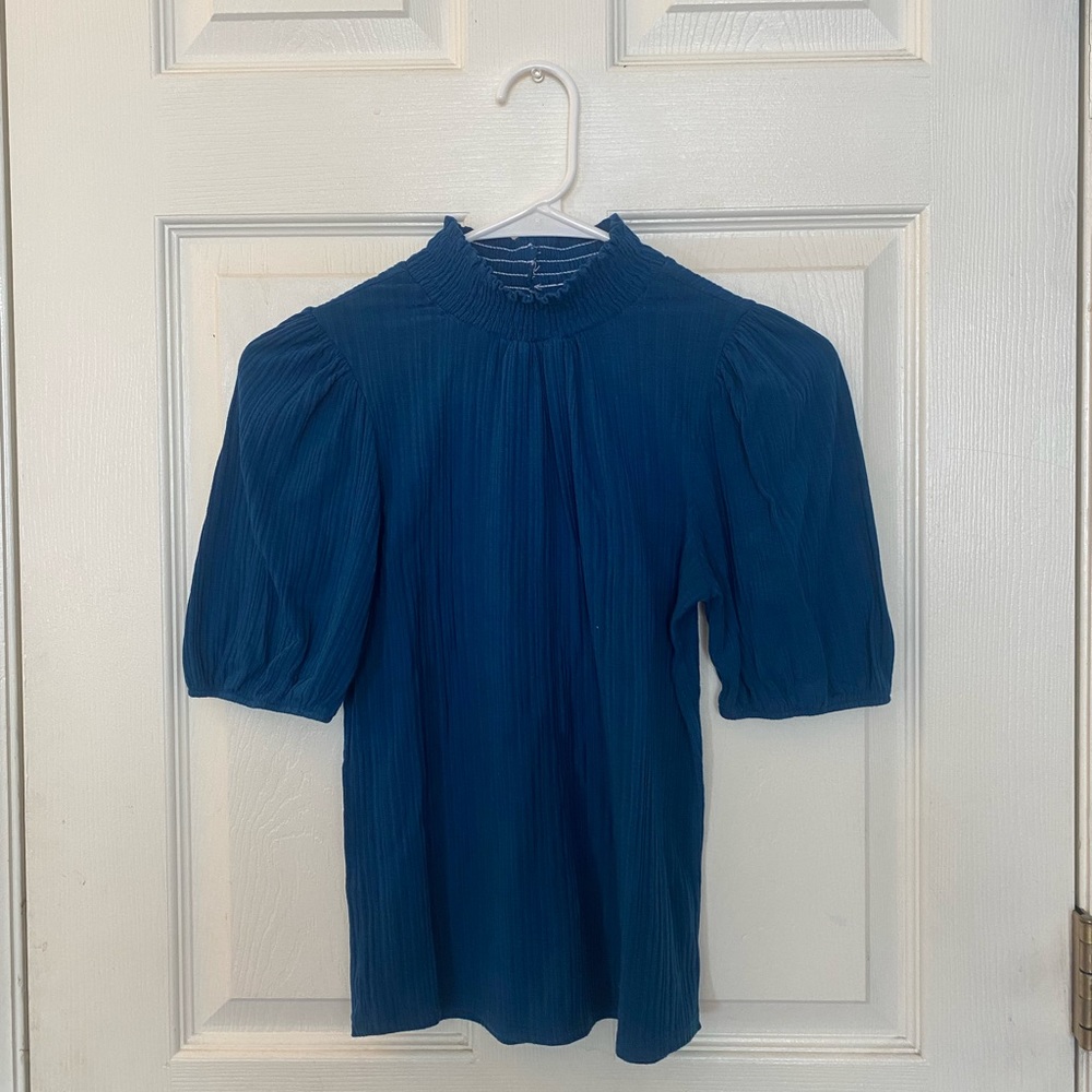 Small shirt size, true to size, comfortable fit.